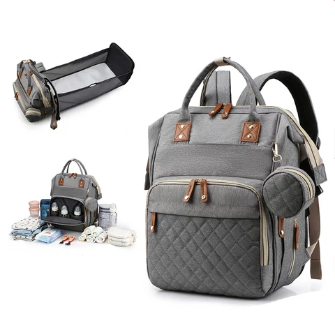 sac maman bébé avec lit