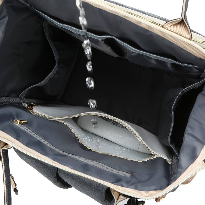 sac maman bébé avec lit